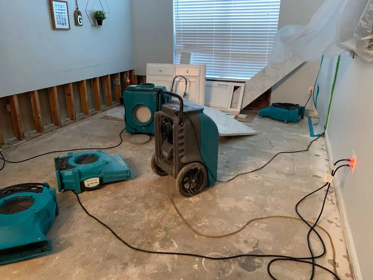 Dehumidifier in flood-cut room for Water Damage Restoration in Rochester